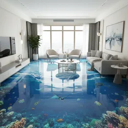 Bright living room featuring ocean floor design grey sofa marble table armchairs and large window