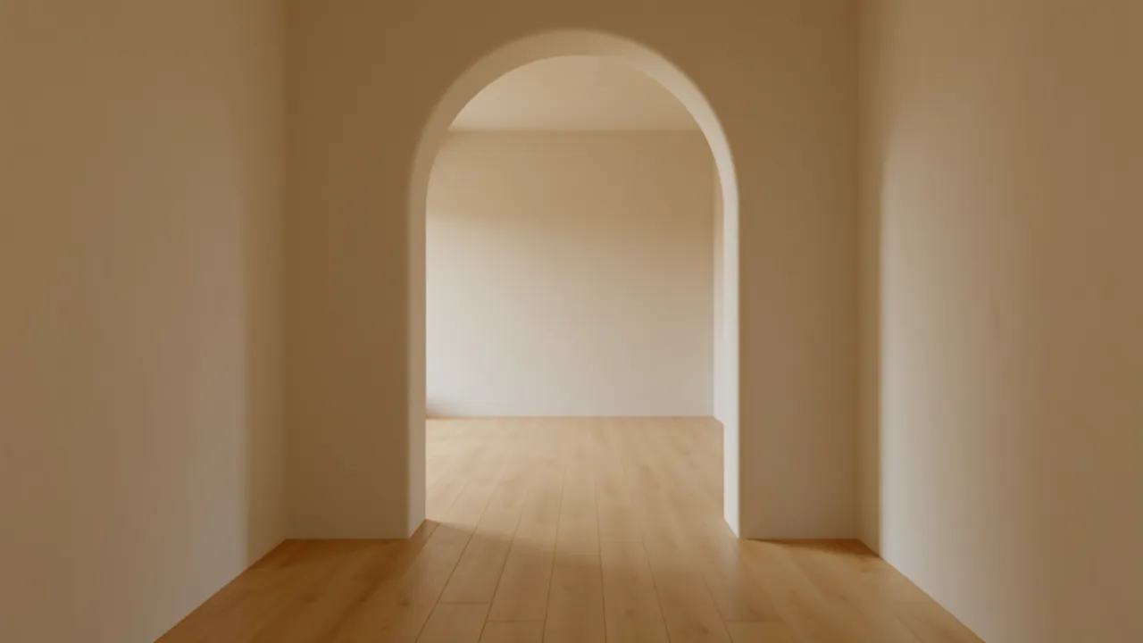 soft plaster hallway with curved arch doorway connecting two rooms