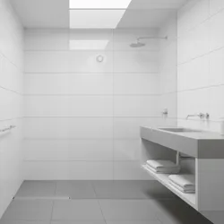 Minimalist white bathroom design featuring roof window shower head grey sink cabinet and white towels