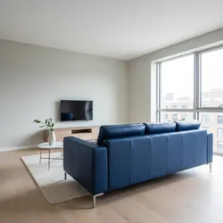 Optimizing a Small Living Room with a Blue Leather Sofa