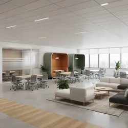 Modern open office space featuring grey sofas and colorful meeting booths next to large windows
