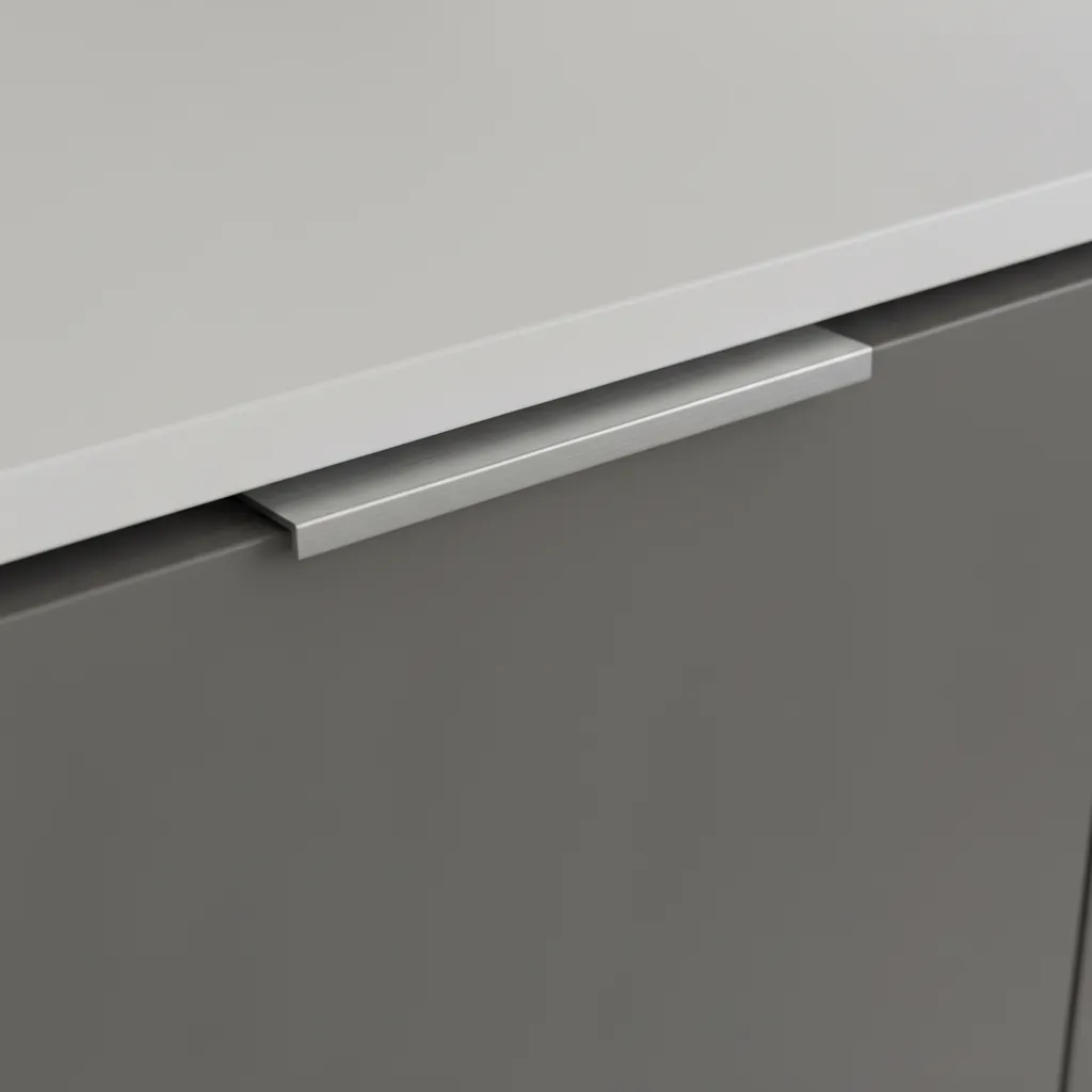 Close up of edge pull hardware installed on kitchen drawer