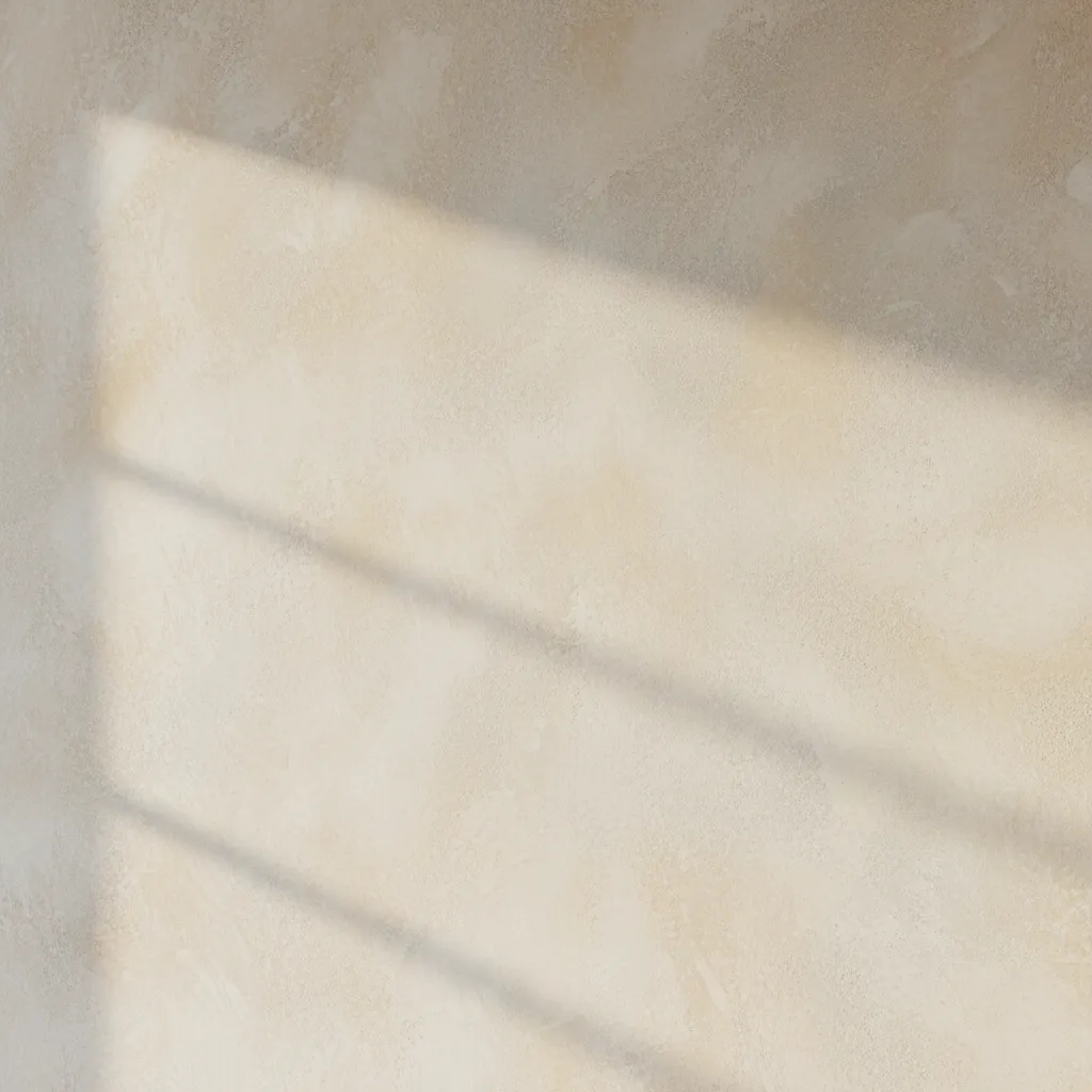 Close view of limewash wall texture showing natural tonal variation
