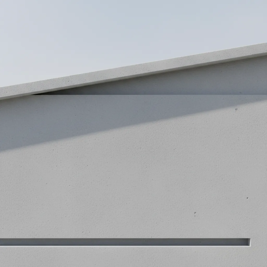modern exterior wall with drip edge and sloped cap for water drainage