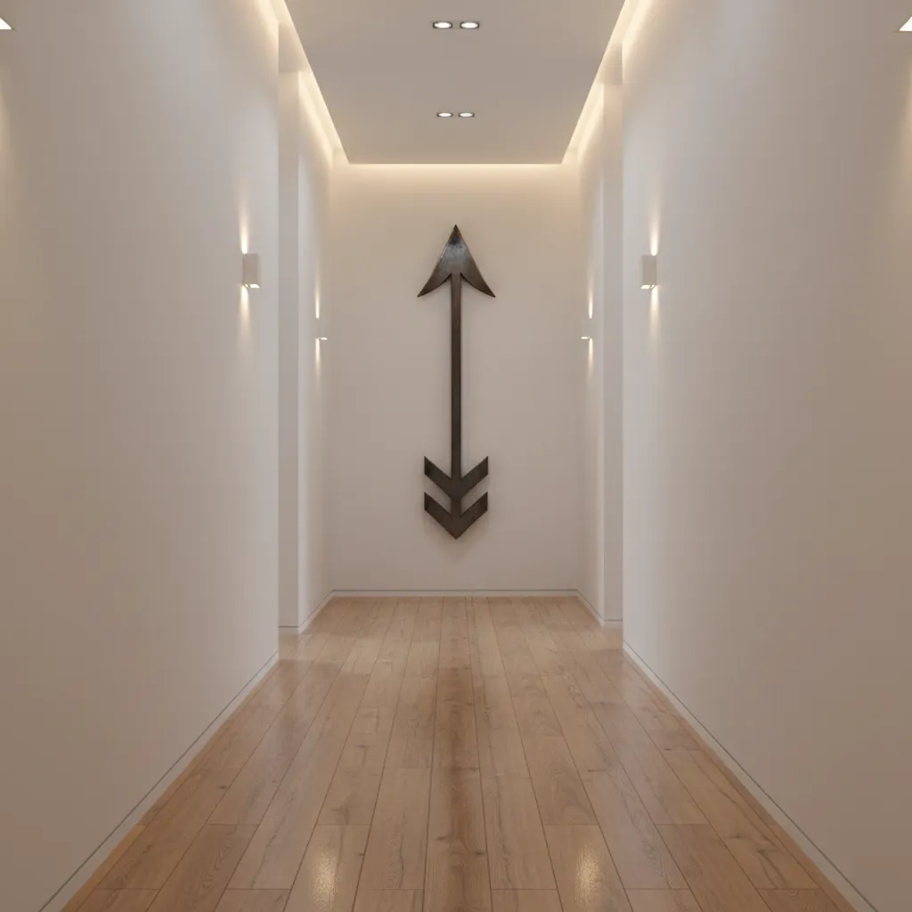 Metal arrow wall decor guiding direction along hallway wall