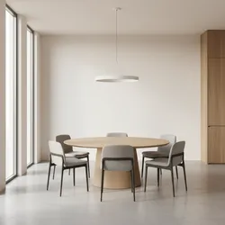 Minimalist dining room featuring round wooden table with six grey chairs and ring ceiling light