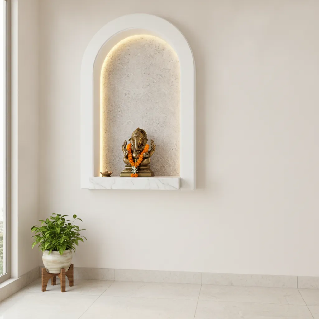 small apartment puja niche with POP frame and warm lighting
