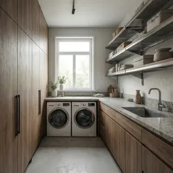 Modern laundry room with wood cabinets washing machines stone countertop metal shelves and a window