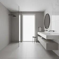 Minimalist bathroom with white marble wall tiles light grey floor round mirror and floating sink